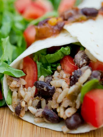 vegan burrito with black beans, rice and veggies