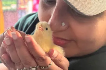 a person holding a bird